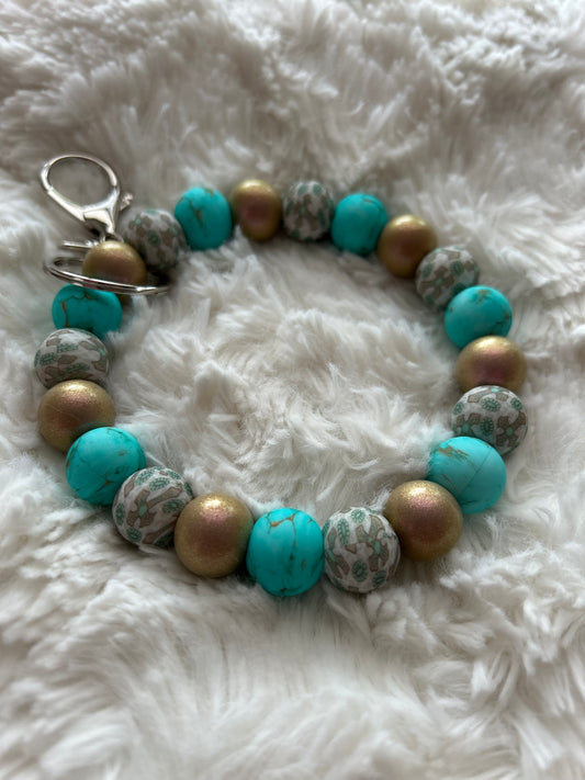 Turquoise Western Cross Wristlet