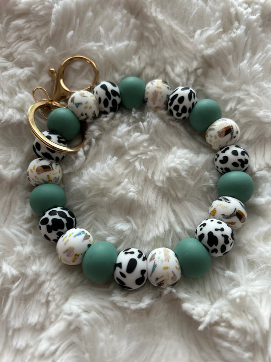 Green Cow Print Wristlet